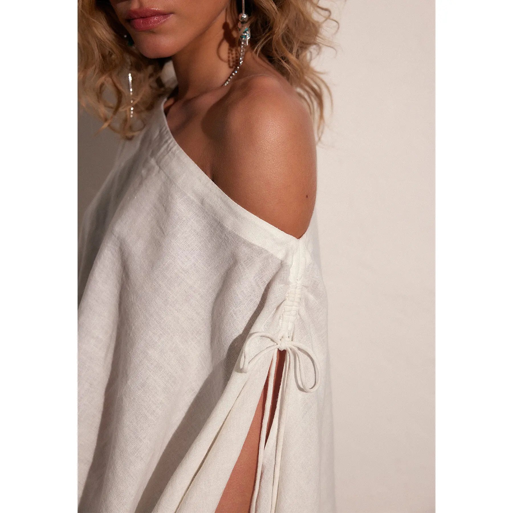 Elevate Your Summer Style with the Hixiaohe Women's Convertible Cape Top - Casual Split Sleeve Poncho for Effortless Vacation Looks