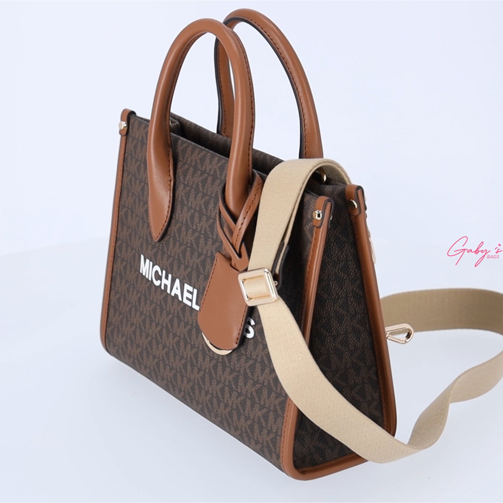 Elevate Your Style with the Michael Kors Mirella Small Top Zip Shopper Tote Crossbody in Brown MK Signature